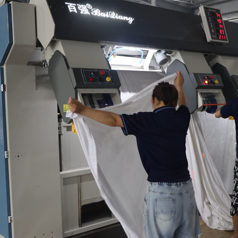 布草洗涤公司烫平机输送前端有必要用展布机吗？